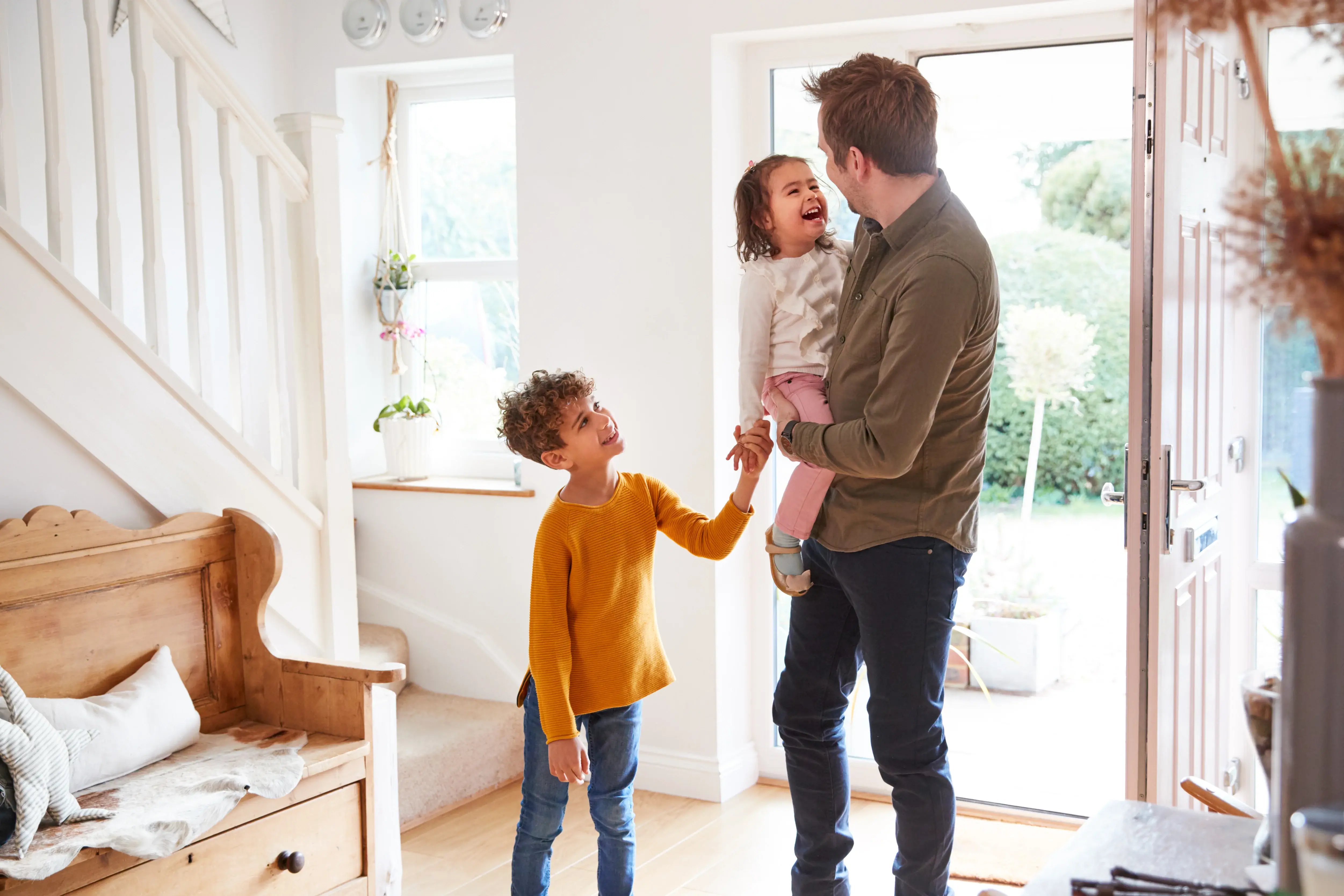 father-and-children-at-the-entrance